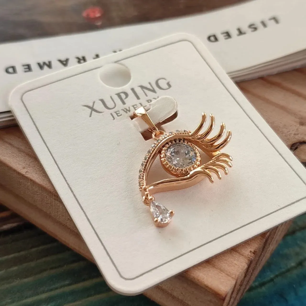 پلاک زنانه طرح چشم جادویی برند ژوپینگ