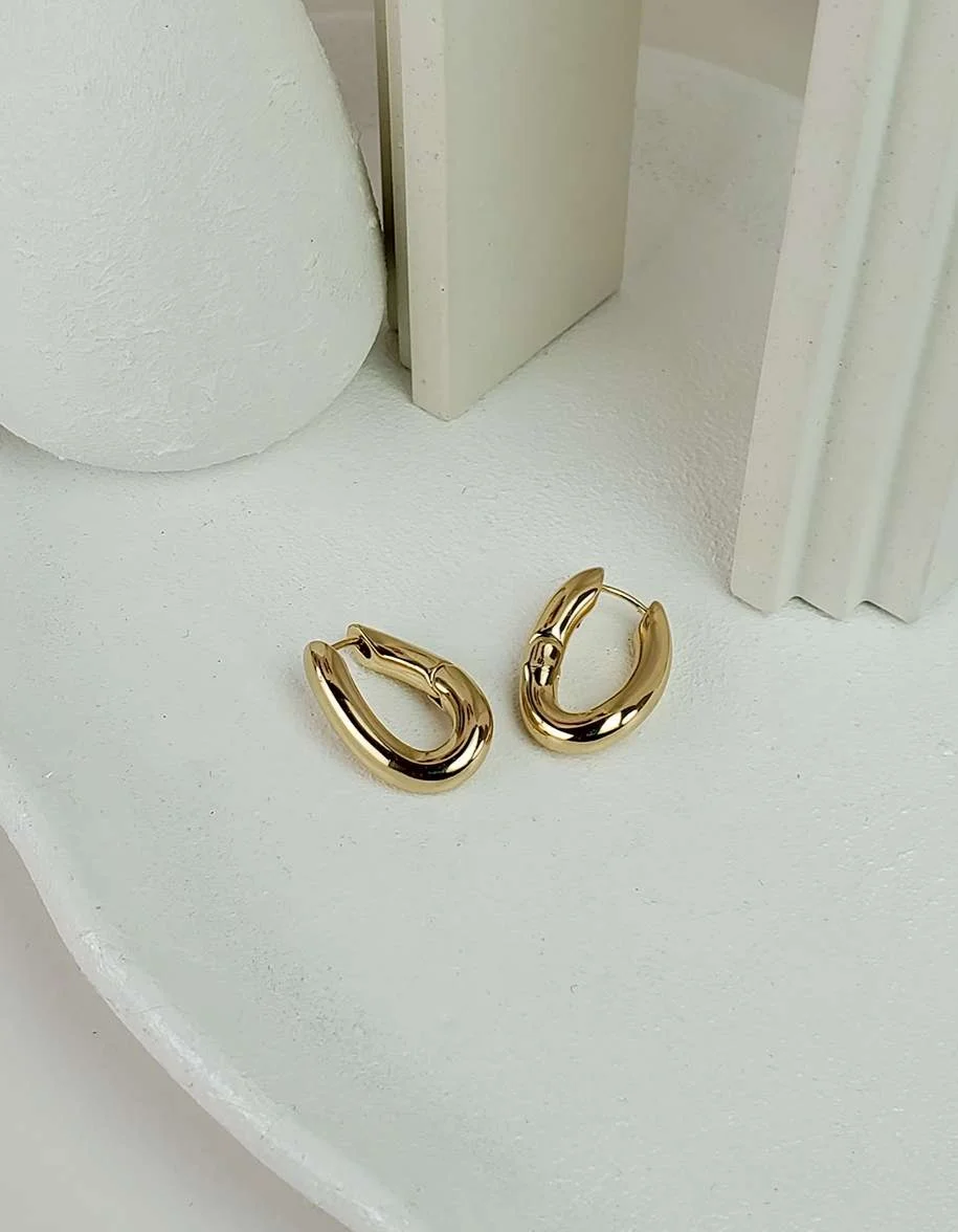 گوشواره حلقه ای زنانه طرح قوس نرم طلایی